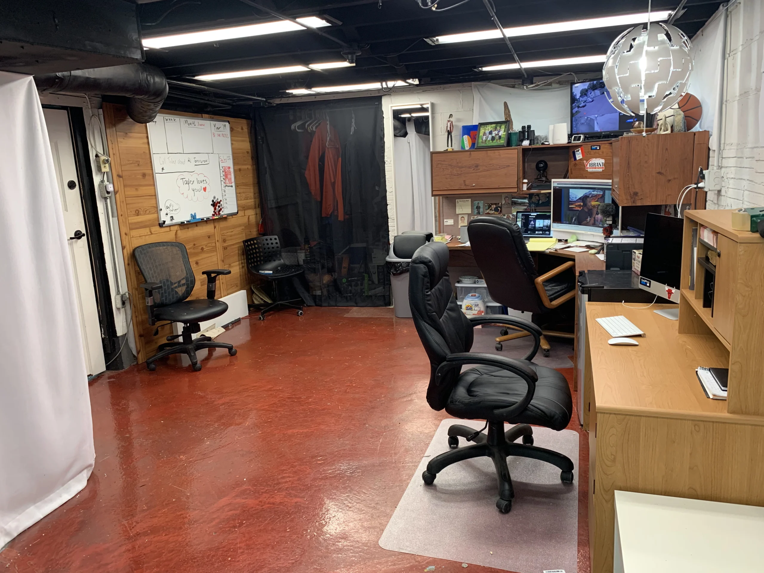 Wide view of the clean and organized company workspace.